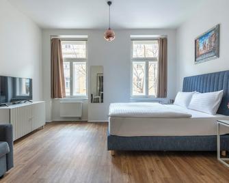 Prague Tales Boutique Residence by Dwellfort - Prague - Bedroom