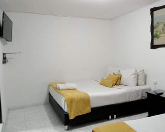 هوتل كاسا نيني - بوغوتا - غرفة نوم