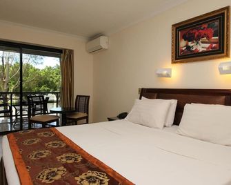 Novena Palms Motel - Northgate - Bedroom