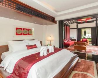 Langzhong Hirizon Hotel - Нанчон - Спальня