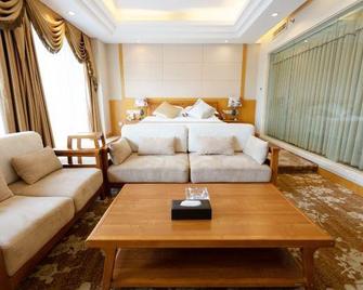 Tian Yuan Hotel - Honghe - Bedroom