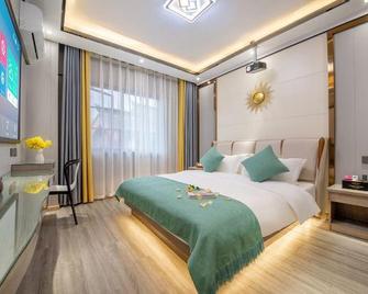 Chuxiong Du Shangxilou Hotel - Chuxiong - Bedroom