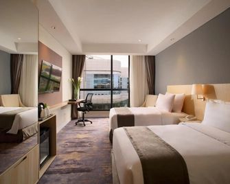 Hotel Grandhika Pemuda - סמראנג - חדר שינה