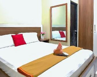 Akavi Homestay Jayapura Redpartner - Jayapura - Schlafzimmer