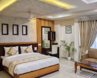 Emporio Hotel - Haldwani - Bedroom
