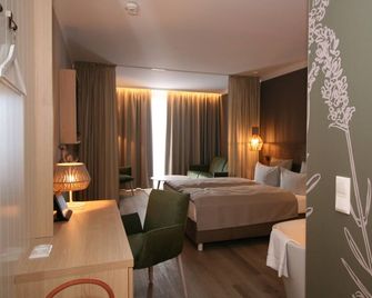Landhotel Rittmeister & Kräuter-Spa Adults Only - רוסטוק - חדר שינה