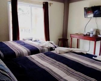 La Delphina Bed and Breakfast Bar and Grill Twin Room - La Ceiba - Ložnice