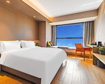 True Go Hotel (Changchun Ecological Plaza Exhibition Center Jingyue University Town) - Changchun - Makuuhuone