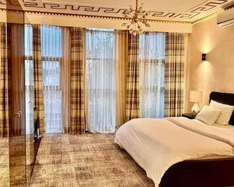 Best Hôtel Aéro Batignolles - Brazzaville - Camera da letto