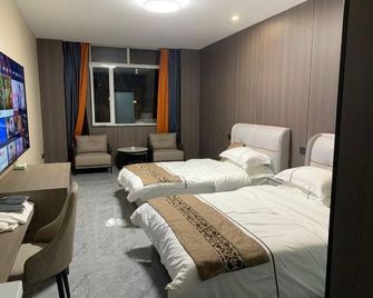 Yurong Shanzhuang Hotel - נאנז'ינג - חדר שינה