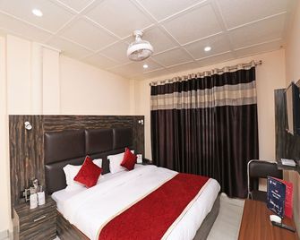 Hotel O Abc Residency - Srinagar - Schlafzimmer