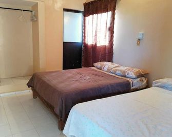 Casa Hotel Mar y Paz By Rotamundos - Playa de Chachalacas - Schlafzimmer