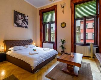 Select City Center Apartments - Braşov - Slaapkamer