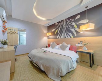 Thank Inn Hotel Sichuan Luzhou Longmatan District Trade City - Luzhou - Bedroom