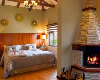 Hosteria Duran - קואנקה - חדר שינה