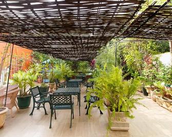 Coimbra Hotel & Spa - ביסאו - פטיו