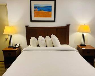 تشارلوت تاون إن آند كونفرنس سنتر - شارلوت تاون - غرفة نوم