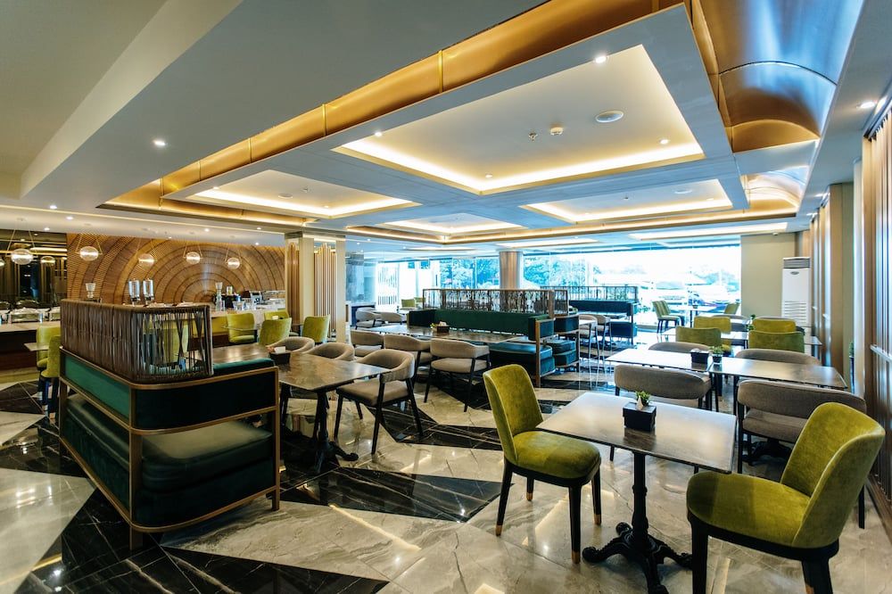 زوري هوتل - إيلويلو ستي - مطعم