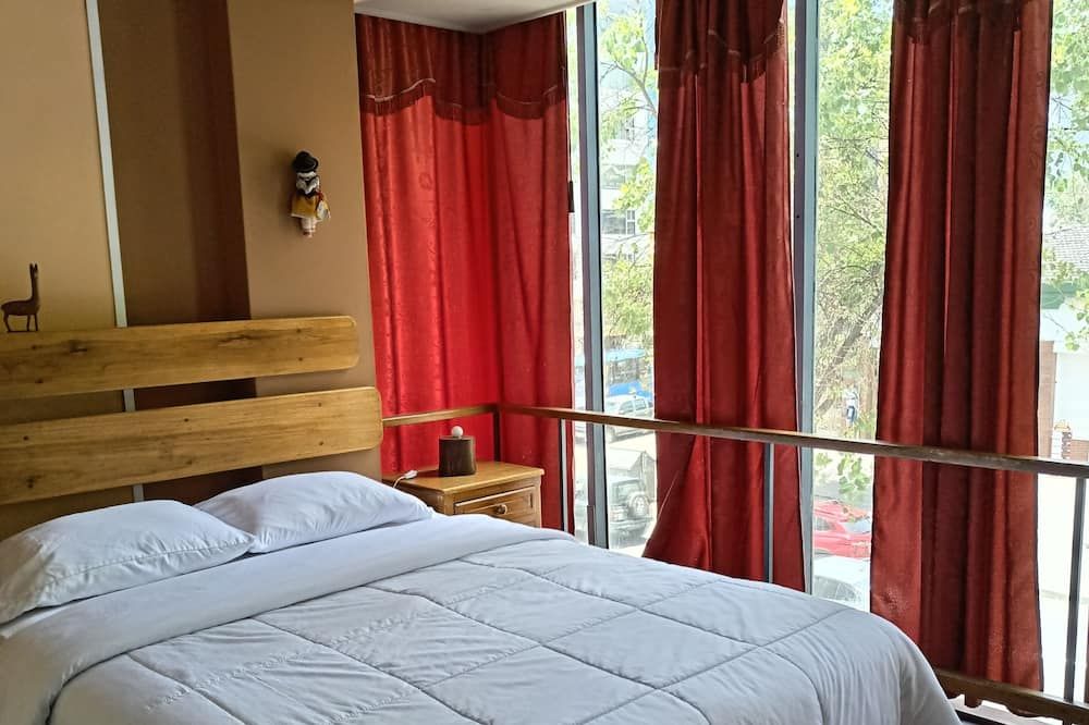 أوتيلو - كويتو - غرفة نوم