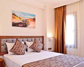 Troiada Otel - Gökçeada - Slaapkamer