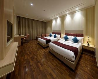 Palm Green Hotel & Resort - Yeni Delhi - Yatak Odası