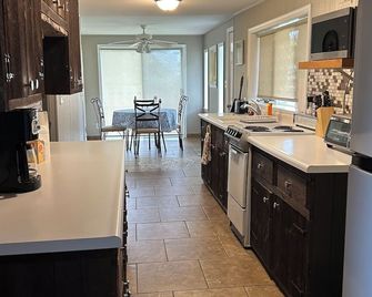 Contactless Check In -- Sand Point Private Lake/Beachfront Cottage - Pigeon - Kitchen