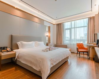 Baoju Hotel - Haikou - Soveværelse