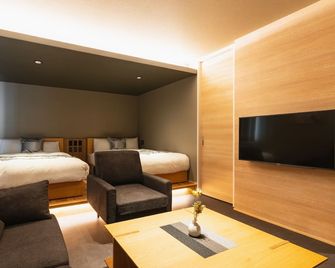 Grand Base Beppu Ekimae - Beppu - Bedroom