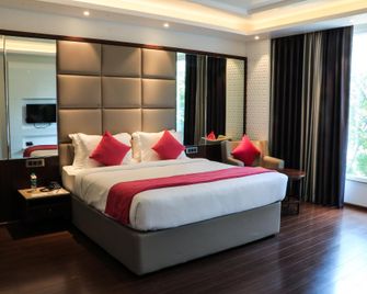 Tania President Inn - Shirdi - Ložnice