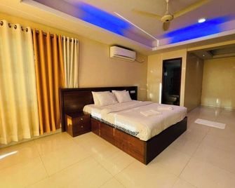 Hotel Opera Ocean - Cox's Bazar - Schlafzimmer