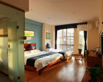 Miao Dongli Hotel Apartment - Qiandongnán - Habitación