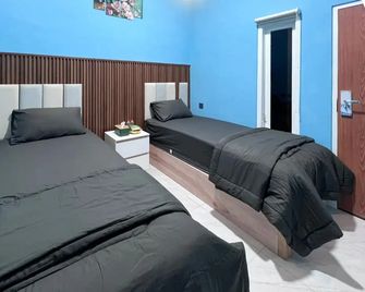 Griya Prashasta Mitra RedDoorz - Kediri