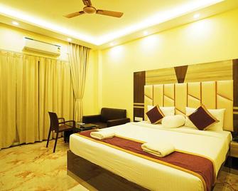 Grand Beach Resort - Mandarmani - Schlafzimmer
