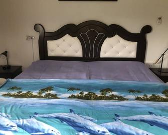 My Ozi Perl Guest Houses - Villas - Baie Sainte Anne - Bedroom