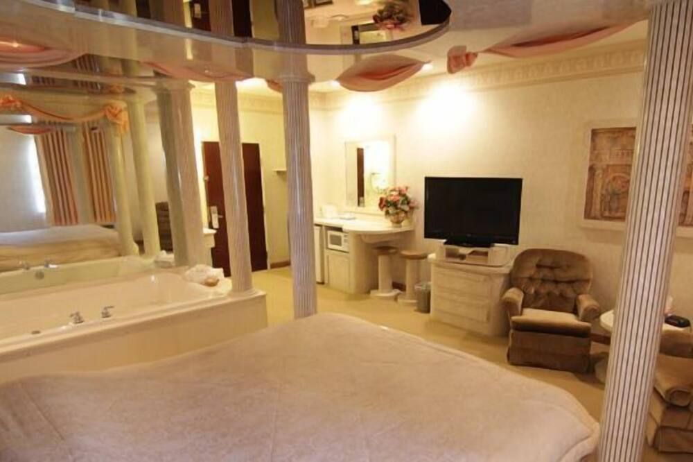 Magnolia Inn & Suites - Southaven - Schlafzimmer