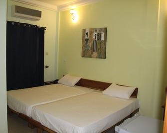 Villy Guest House - Ouagadougou - Bedroom