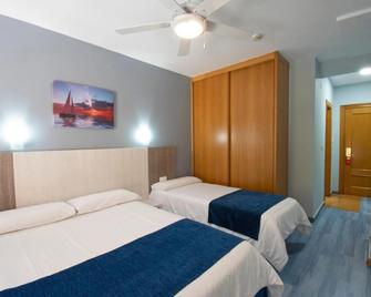 Hotel Campomar - Isla - Schlafzimmer
