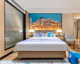 Vienna International Hotel (Yichang Zhongnan Road Branch) - Yichang - Bedroom