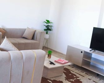 Charming 2-Bedroom Apartment in Sidi Bouzid Essafir Residence - A - Sidi Bouzid - Sala de estar