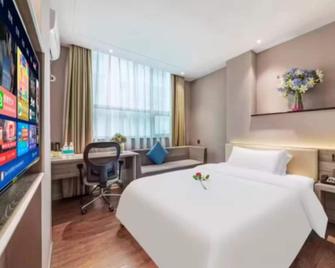 Sanyuan Hotel (Wuling Square) - Chenzhou - Schlafzimmer
