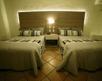 Hotel La Mansion Suiza - Aguascalientes - Phòng ngủ