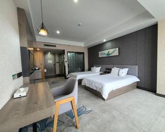 Mulan International Hotel - Shangqiu - Bedroom