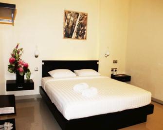 Guardian Family Hotel - Sorong - Schlafzimmer