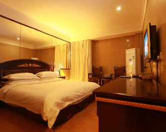 Laike Yangming Hotel - Chizhou - Спальня