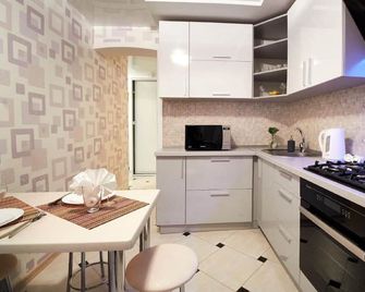 PaulMarie Apartments on Kozhara - Gomel - Kitchen