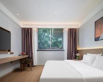 Nanyang Hotel - Nanyang - Bedroom