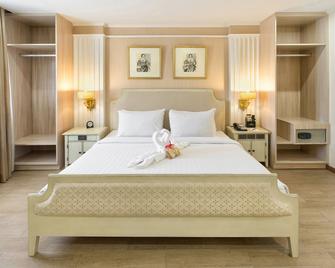 Golden Prince Hotel & Suites - סבו סיטי - חדר שינה