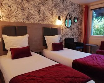 Hôtel Monet - הונפלואור - חדר שינה