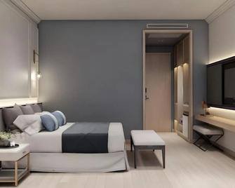 Mayflower Grande Hotel Phitsanulok - Phitsanulok - Habitación