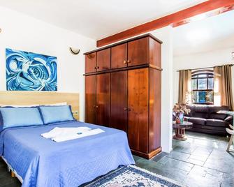 Velinn Feiticeira Praia Hotel - Ilhabela - Kamar Tidur